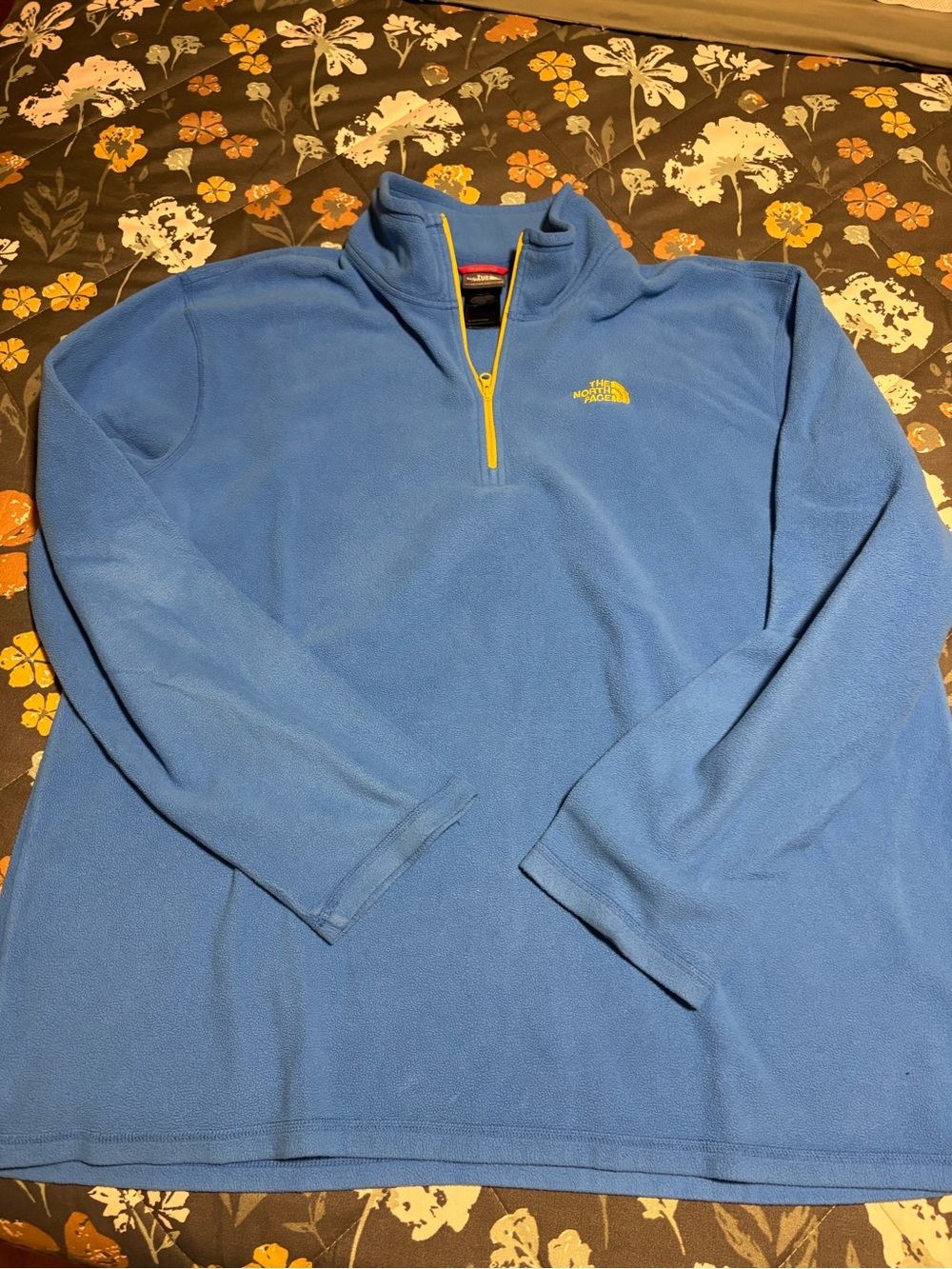 The North Face Light Blue Half-Zip Fleece with Yellow Accents